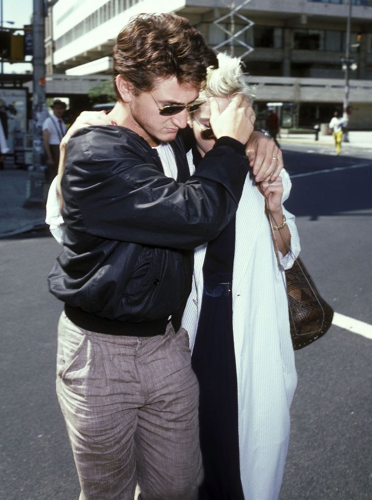 Actor Sean Penn and singer Madonna leave the Mitzi E Newhouse at Lincoln Center, New York, New York, August 13, 1986. They were on a break during rehearsals for the Lincoln Center Workshop's production of 'Goose and Tomtom.'