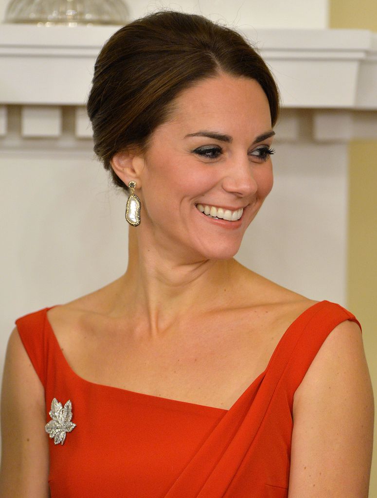 Kate wearing Soru earrings in 2016 during royal tour of Canada wearing red dress