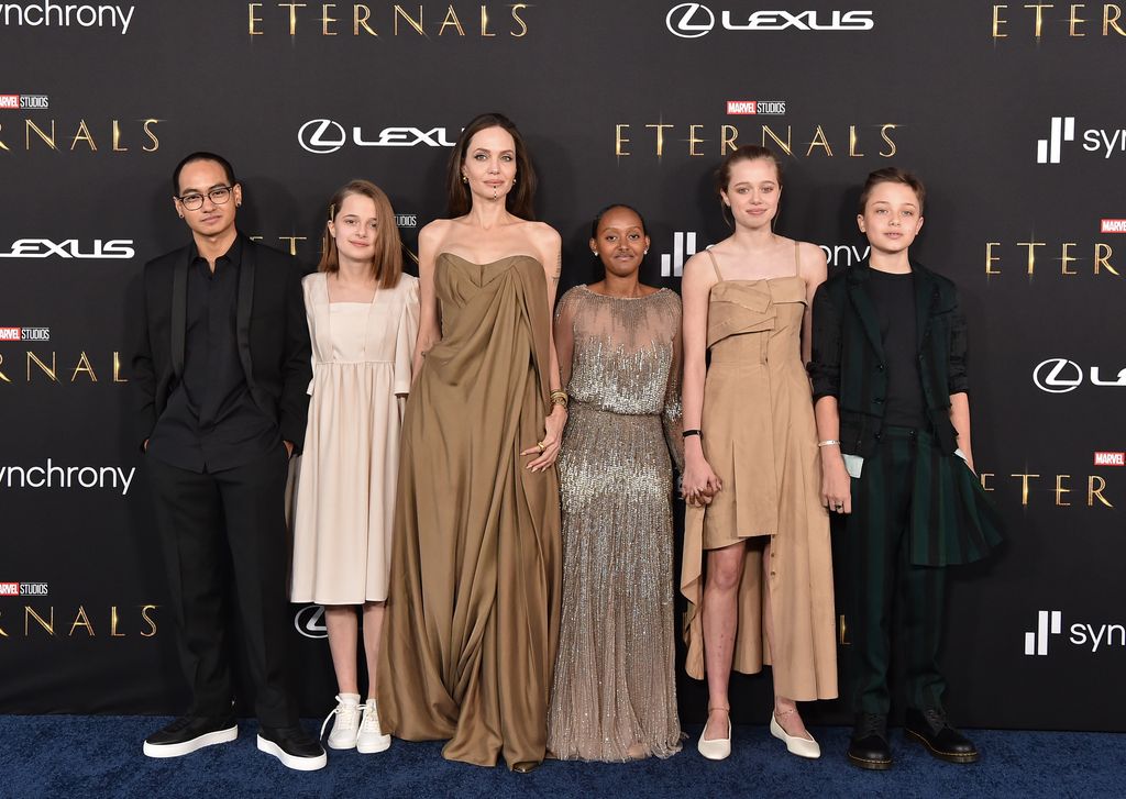 Maddox Jolie-Pitt, Vivienne Jolie-Pitt, Angelina Jolie, Zahara Jolie-Pitt, Shiloh Jolie-Pitt and Knox Jolie-Pitt attend the Los Angeles Premiere of Marvel Studios' "Eternals" on October 18, 2021 in Los Angeles, California.