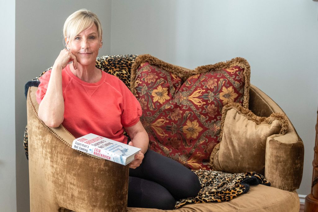 Erin in armchair holding book