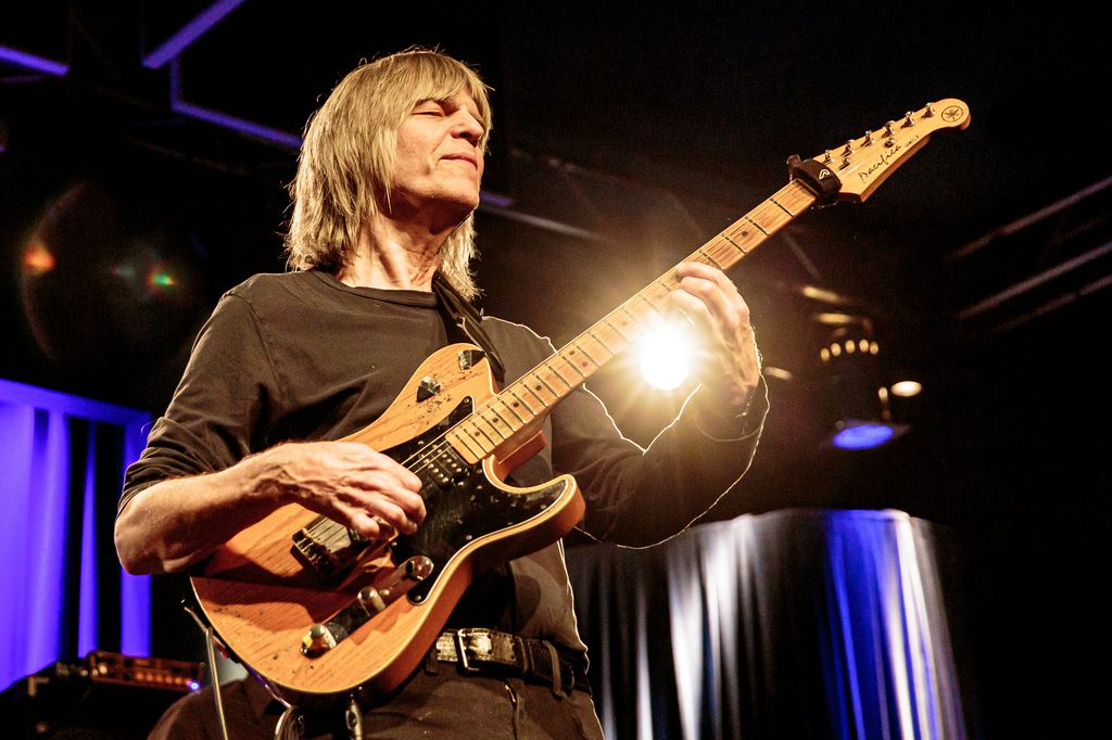 Mike Stern performing on guitar