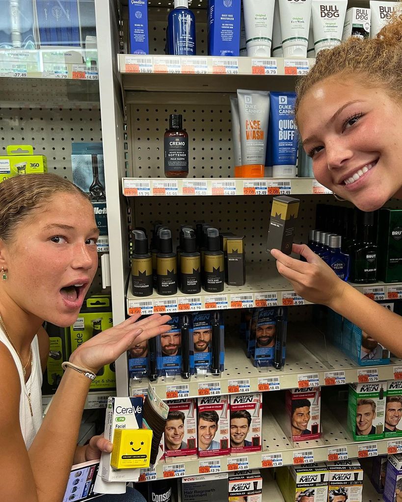 Michael Strahan's teenage daughters cheered on their famous dad at CVS
