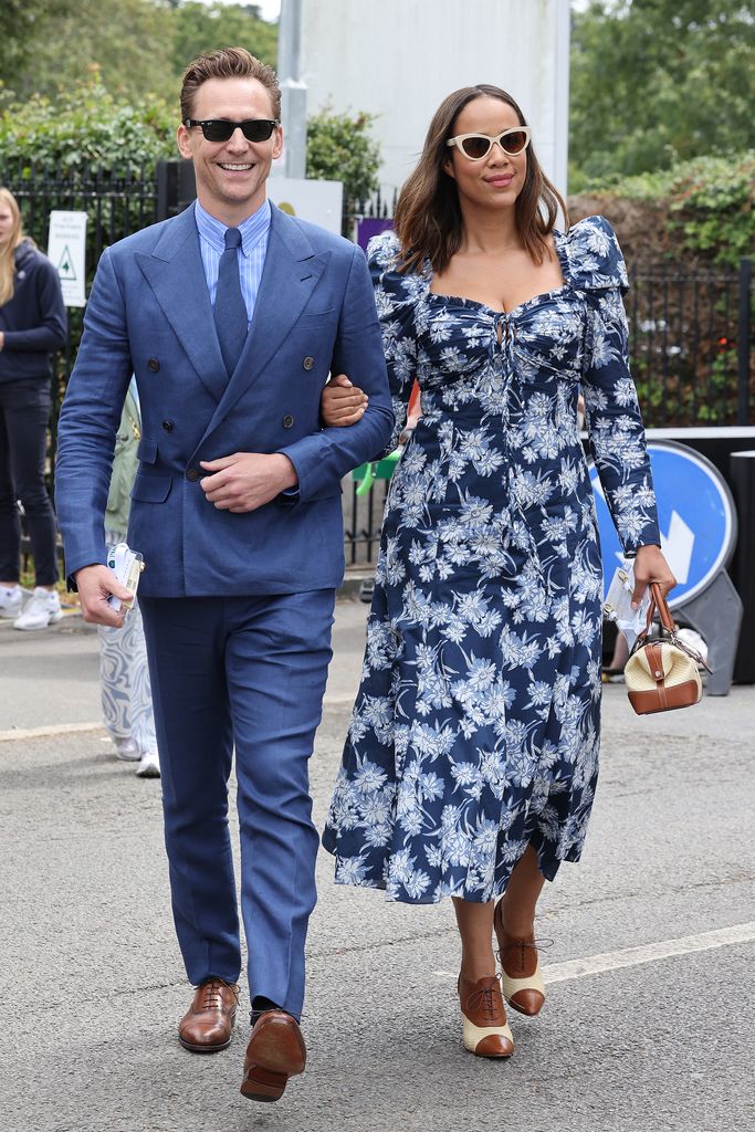 LONDON, ENGLAND - JULY 16: Tom Hiddleston and Zawe Ashton  attend day fourteen of the Wimbledon Tennis Championships at All England Lawn Tennis and Croquet Club on July 16, 2023 in London, England. (Photo by Neil Mockford/GC Images)