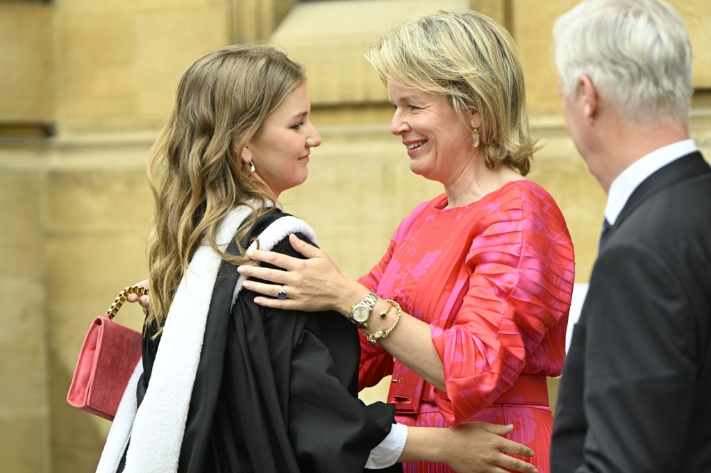 Queen Mathilde hugs Princess Elisabeth