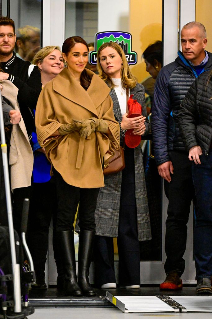 Meghan Markle in belted camel coat