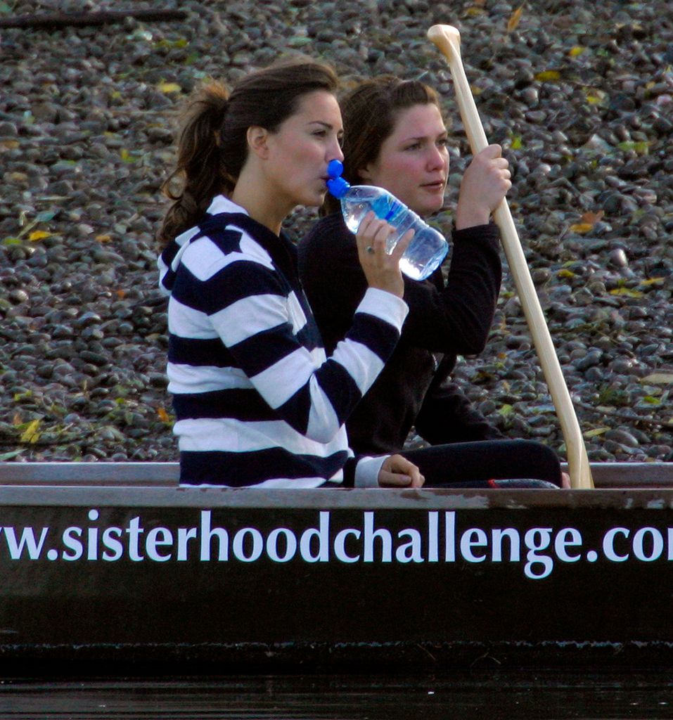 Kate Middleton drinking water while rowing