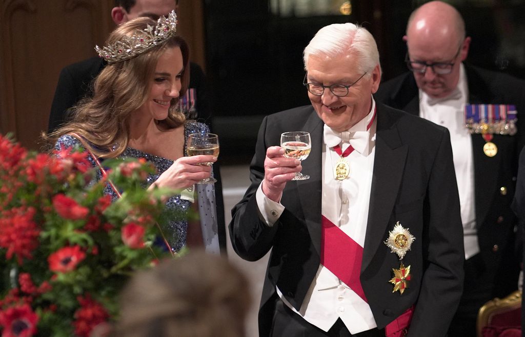 Britain's Catherine, Princess of Wales and Germany's President Frank-Walter Steinmeier toast the glasses