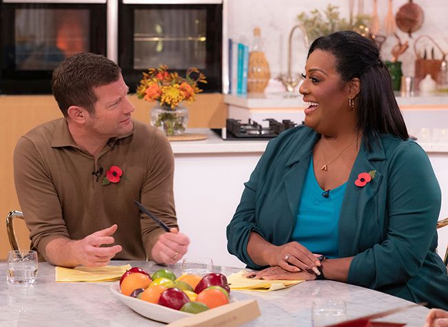 Alison looks at Dermot on This Morning while sat at table