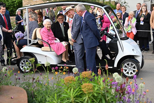 the queen escorted
