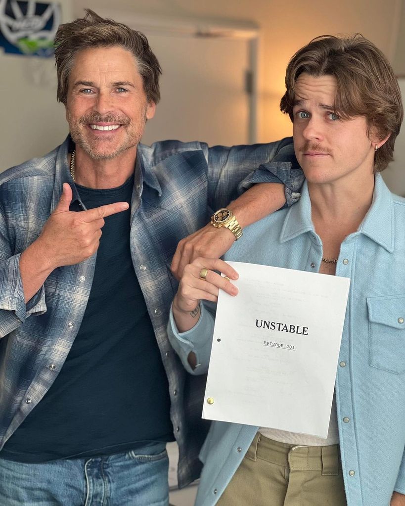 Rob Lowe and his son John Owen Lowe pose with a script for their Netflix show "Unstable," shared on Instagram