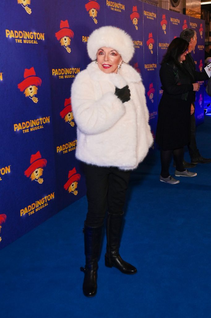 Dame Joan Collins in her winter finery