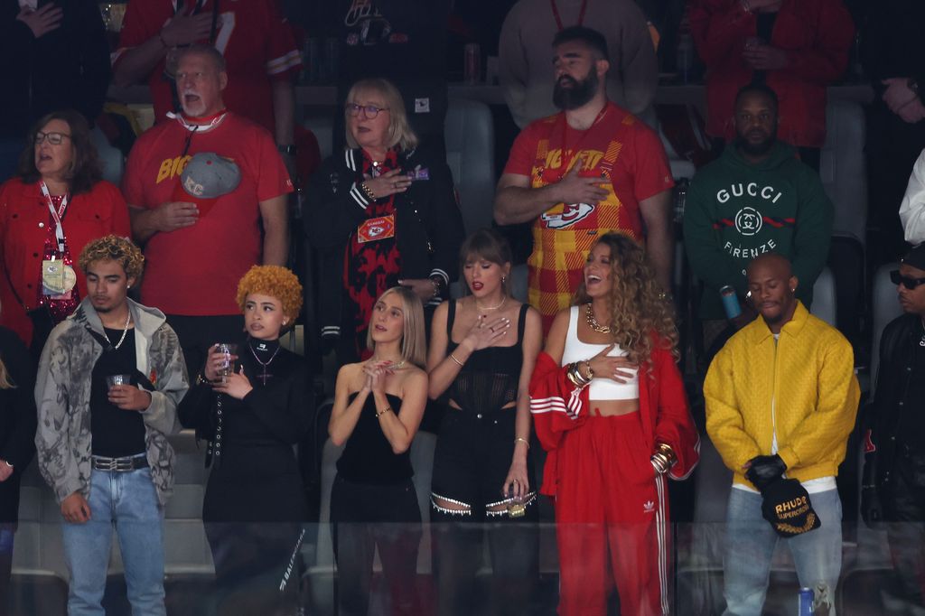 Taylor Swift (fourth from left bottom row) stands in front of Jasaon Kelce (top row second right), and Donna Kelce