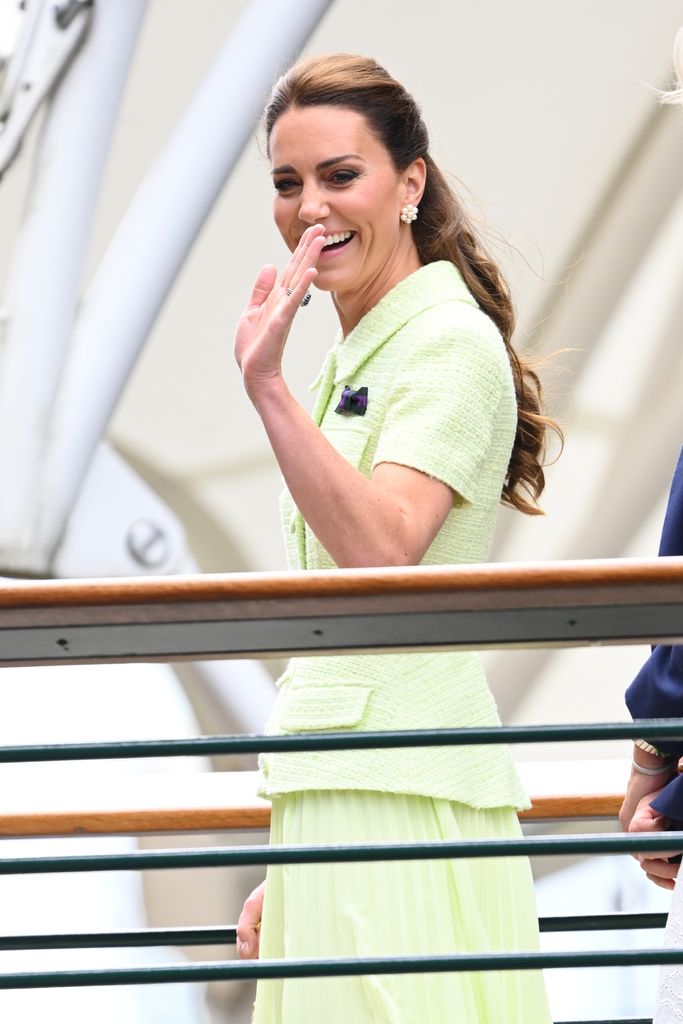 Kate beamed as she waved to crowds