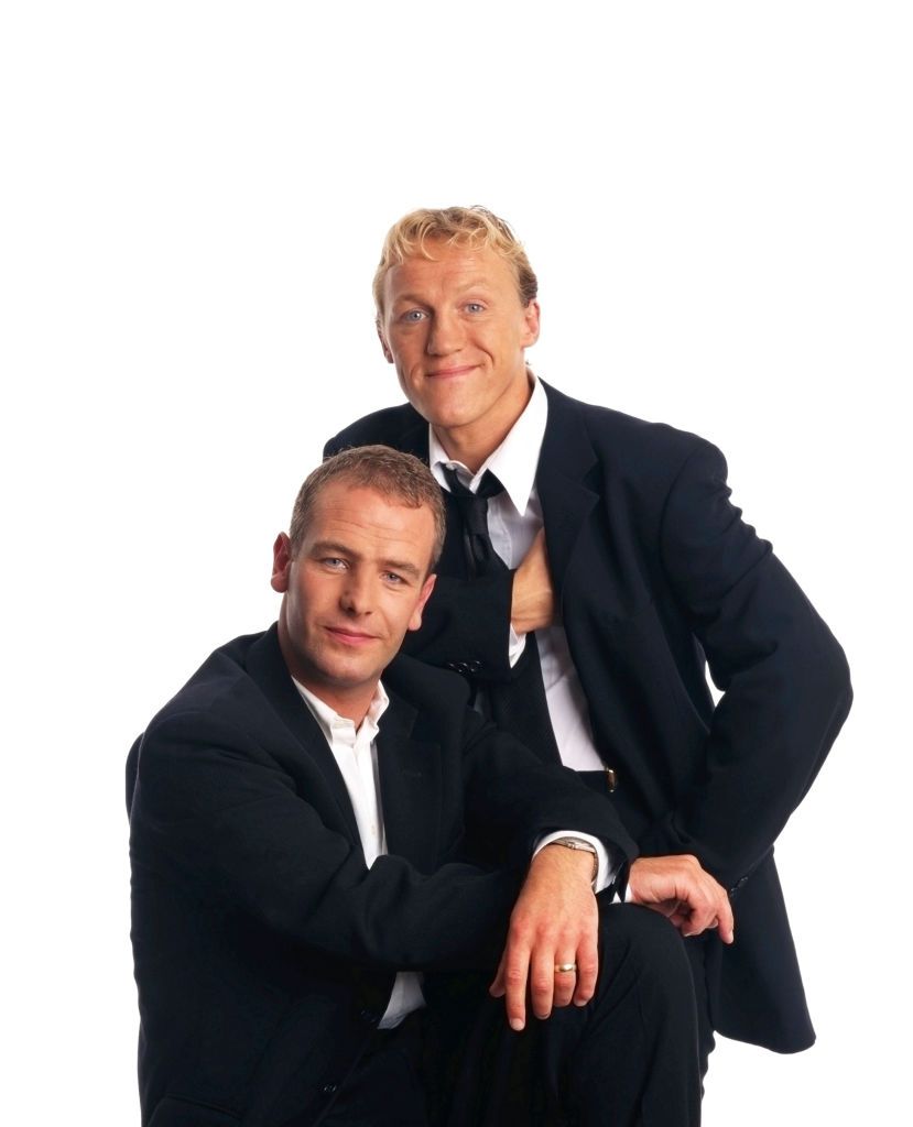 Robson & Jerome pose in suits