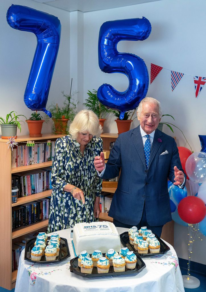 Charles and Camilla cut a cake as they celebrate NHS' 75th birthday