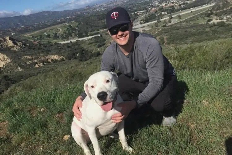 photo of josh hall and dog stella