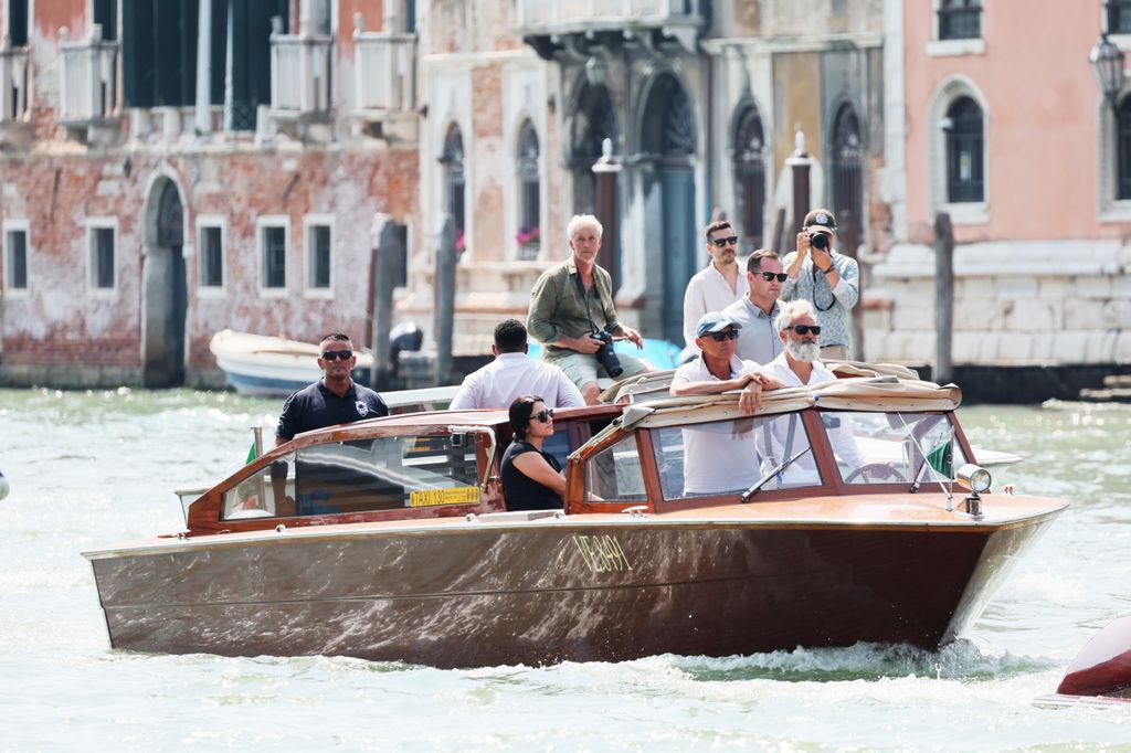 Paparazzi follow the Jeff's Besos boat  ahead of Jeff Bezos and Lauren Sanchez Wedding at Hotel Aman 
