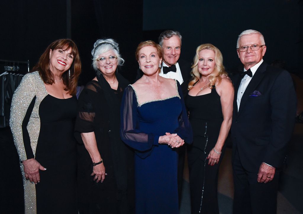Debbie Turner and Angela Cartwright pose with honoree Julie Andrews at the AFI Life Achievement Award: A Tribute to Julie Andrews at Dolby Theatre on June 09, 2022 . Also pictured are fellow Von Trapp stars Nicholas Hammond, Kym Karath and Duane Chase.