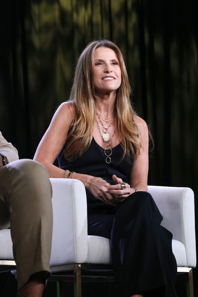 Gina Matthews in black dress