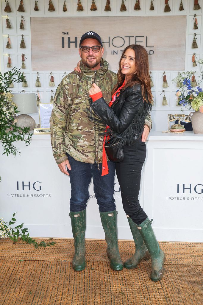 Lisa and George posed in wellies