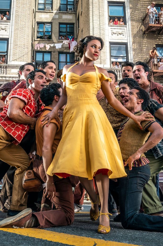 woman in bold yellow dress 