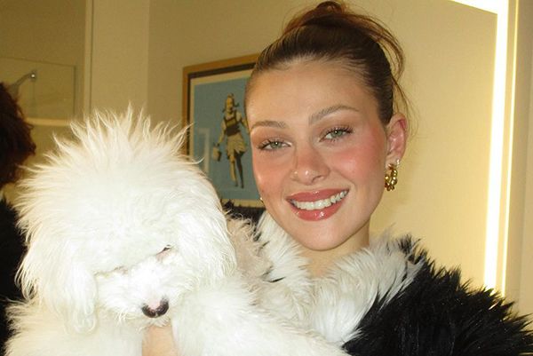 Nicola Peltz Cuddles Her White Fluffy Dog