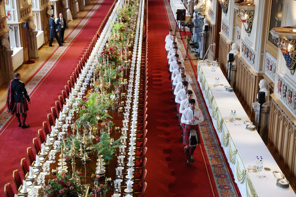 The table for the State Banquet lined by members of staff