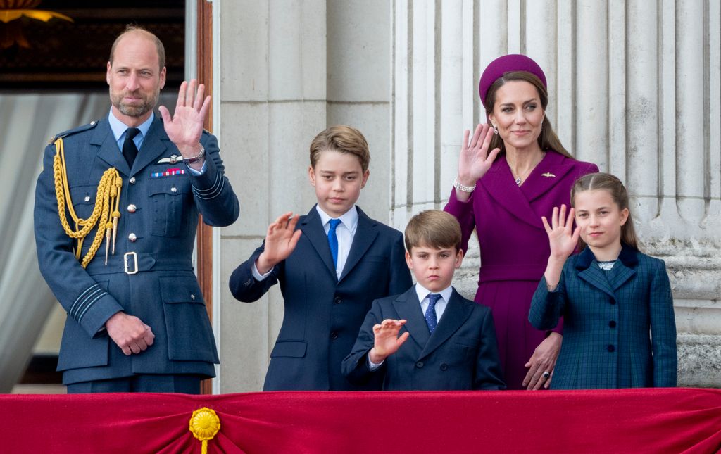 Prince William, Princess Kate and their three kids waving on the Buckingham Palace balcony