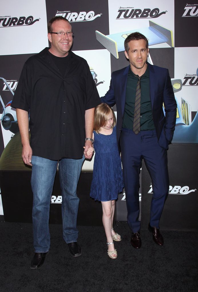 Ryan Reynolds, brother Jeff, and his niece at a movie premiere