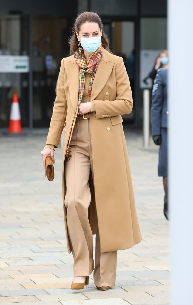 Kate Middleton wears a camel coat and a face mask as she officially opens The Balfour, Orkney Hospital with Prince William