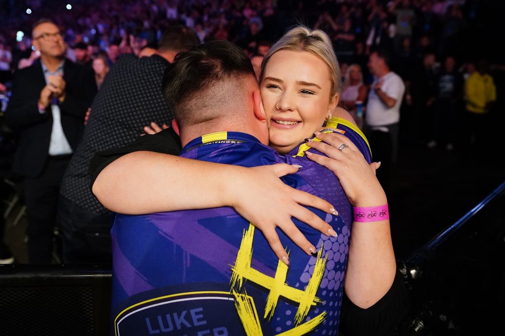 Luke Littler celebrates with his now ex-girlfriend Eloise Milburn after victory in the final against Luke Humphries