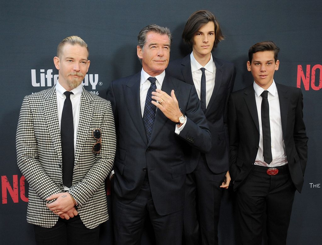 Sean Brosnan, Pierce Brosnan, Dylan Brosnan and Paris Brosnan arrive at the premiere of The Weinstein Company's "No Escape" at Regal Cinemas L.A. Live on August 17, 2015 in Los Angeles, California