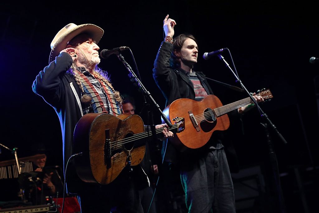 LUCK, TX - MARCH 13: Willie Nelson (L) and Micah Nelson perform in concert during The Luck Banquet on March 13, 2019 in Luck, Texas. (Photo by Gary Miller/Getty Images)