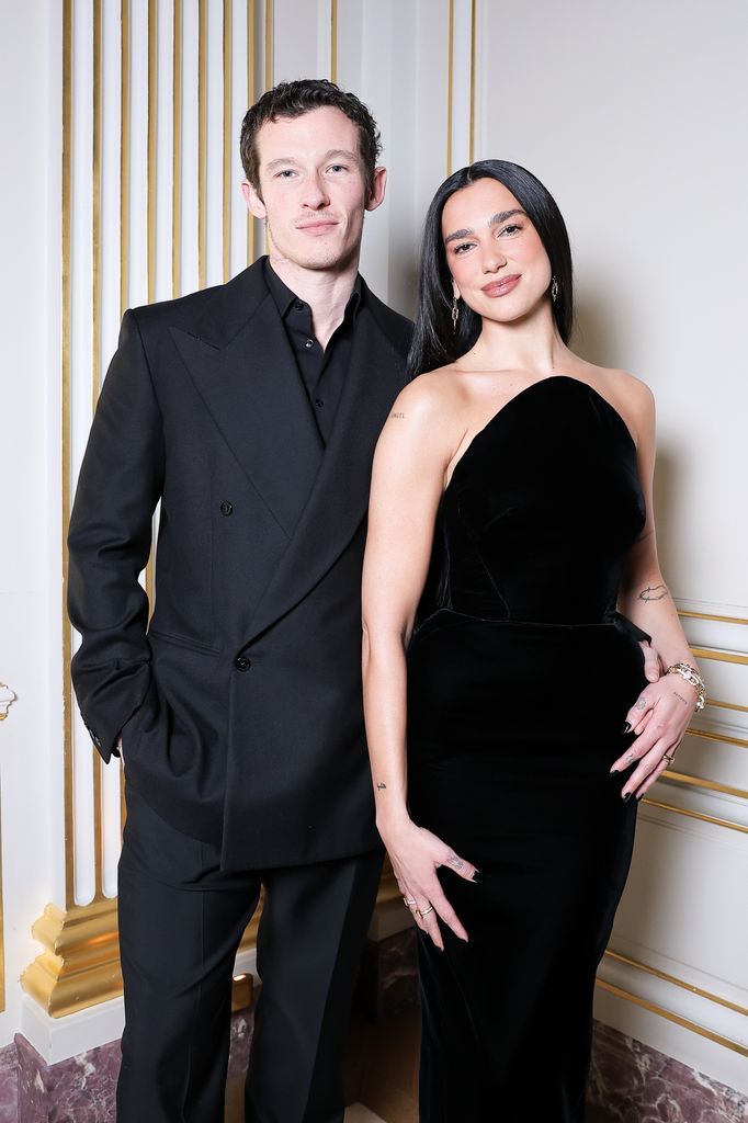 Callum Turner and Dua Lipa pose for a picture together at a Tiffany & Co. event in Paris