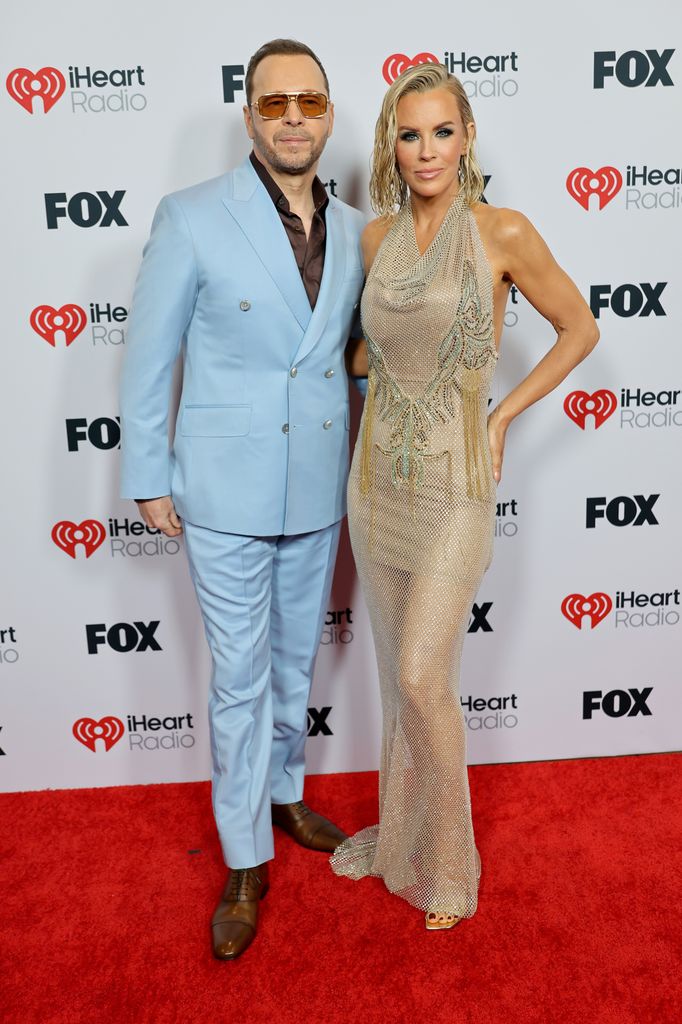 Donnie Wahlberg and Jenny McCarthy attend the 2025 iHeartRadio Music Awards at Dolby Theatre on March 17, 2025 in Hollywood, California