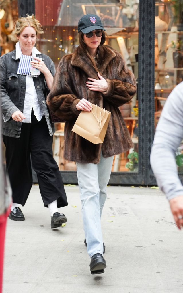 dakota johnson in a fur coat