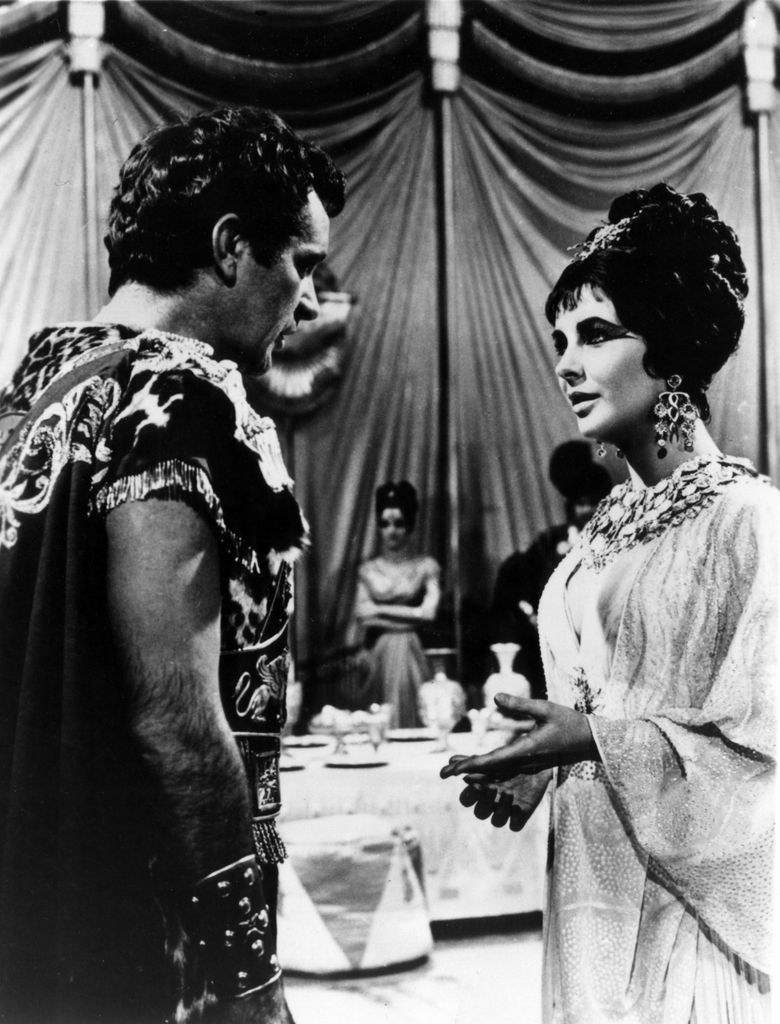 Richard Burton and Elizabeth Taylor in character on the set of Cleopatra