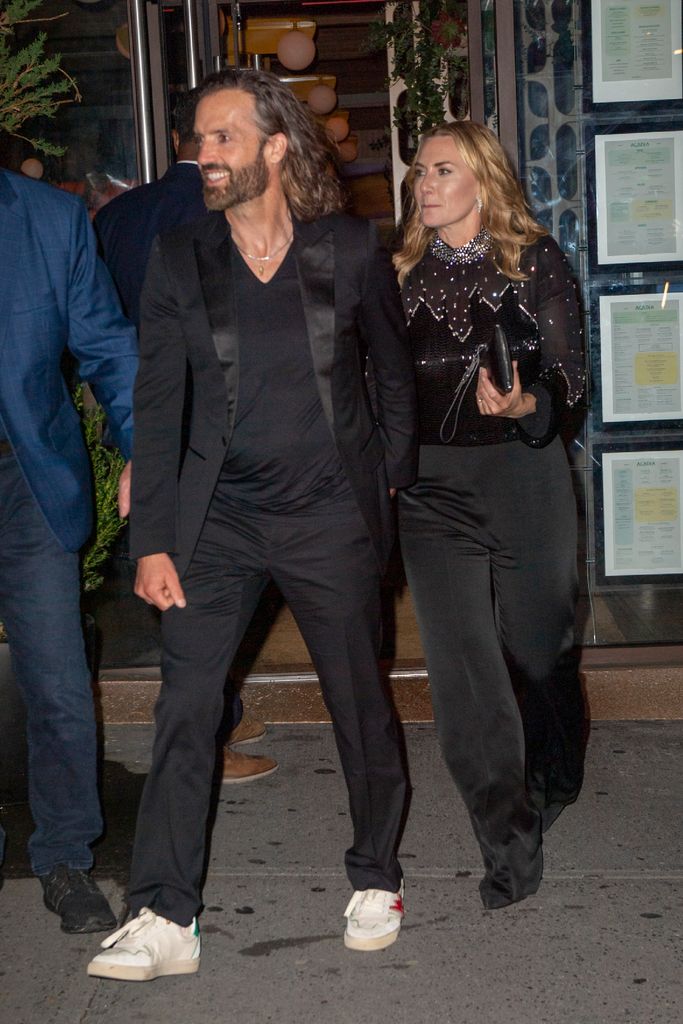 Kate Winslet and Edward Abel Smith walking hand-in-hand