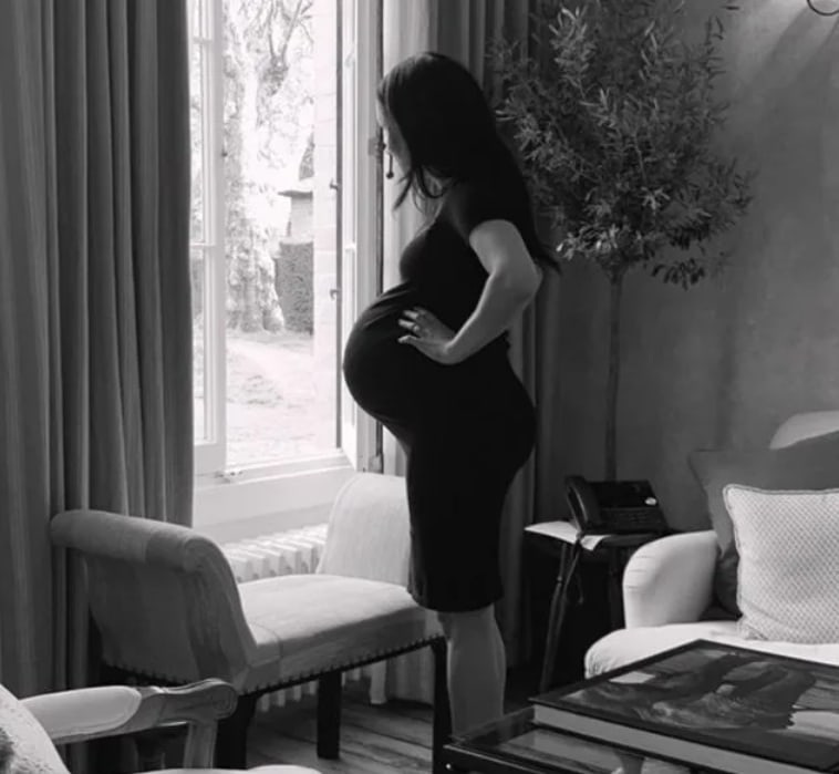 Meghan Markle wearing black dress while pregnant with Lilibet