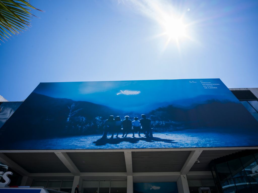 A view of the Palais des Festivals with the official poster at the Palais de Festival ahead of the 77th annual Cannes Film Festival 
