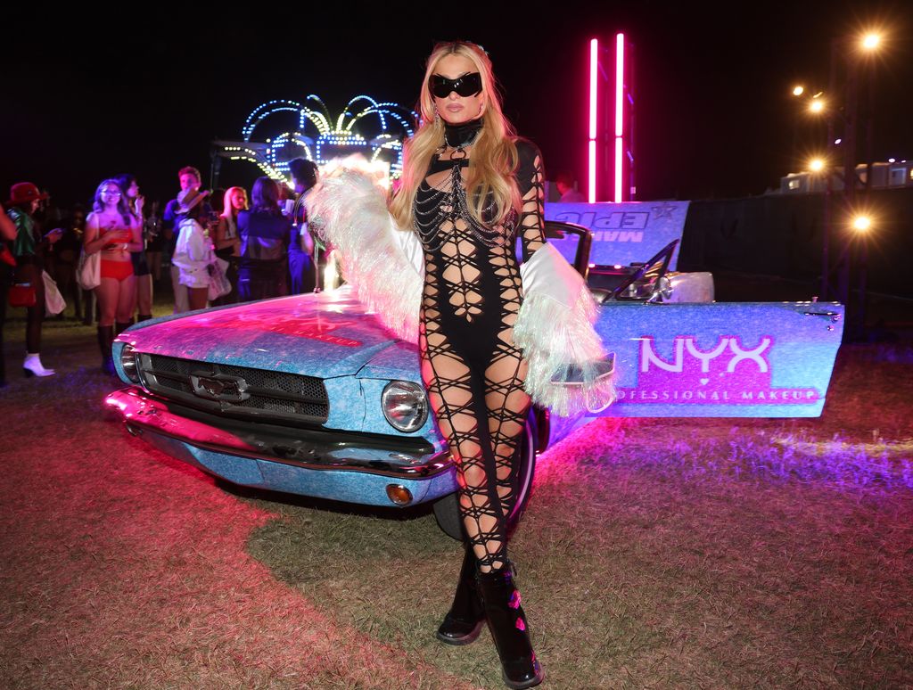 Paris Hilton attends Neon Carnival presented by PATRÃN EL ALTO Tequila on April 12, 2025 in Thermal, California.