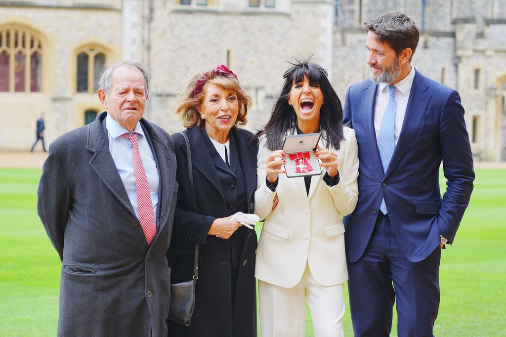 Barry Winkleman, Eve Pollard, Claudia Winkleman and Kris Thykier after Ms Winkleman was made a Member of the Order of the British Empire by King Charles III during an Investiture ceremony at Windsor Castle on December 9, 2025 in Windsor, England. 