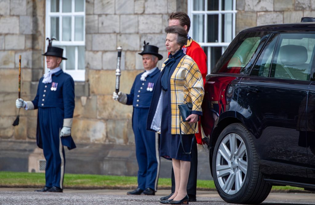 Princess Anne in yellow tartan jacket at Palace of Holyroodhouse following a National Service of Thanksgiving