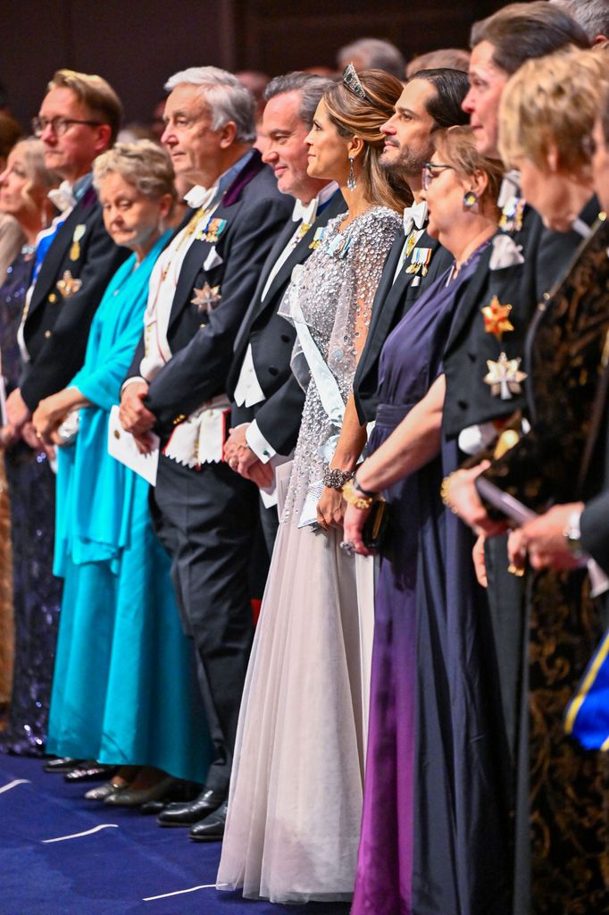 Christopher O'Neill, Princess Madeleine and Prince Carl Philip at the Nobel Prize ceremony