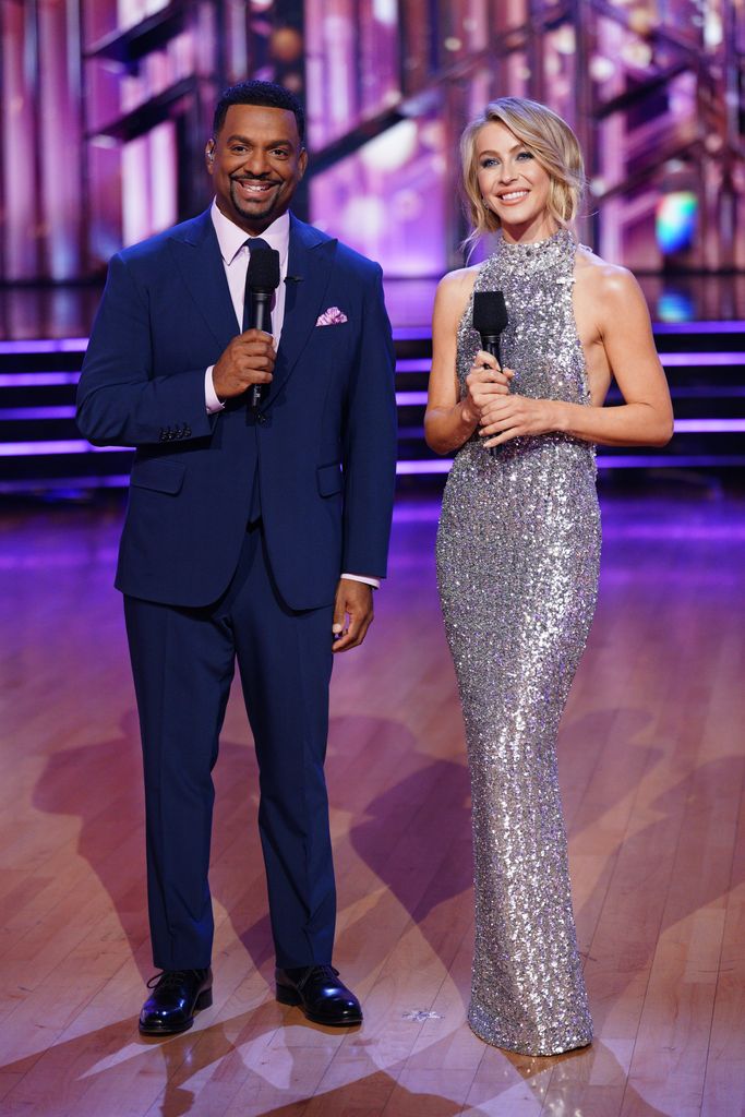 Julianne in silver dress with Alfonso Ribeiro