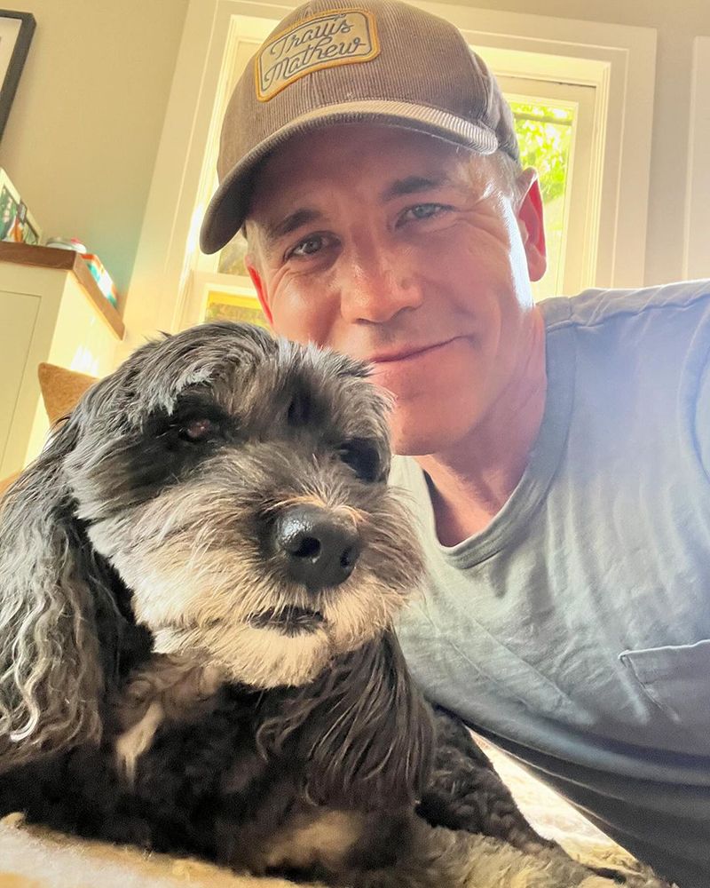 Brian Dietzen with his dog in the kitchen