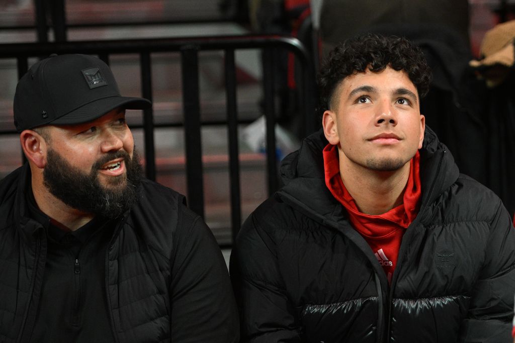 Dylan Raiola and his uncle Donovan Raiola 