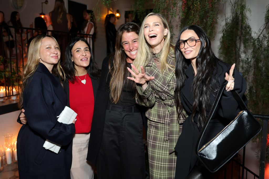 Demi with Sara Foster and friends smiling