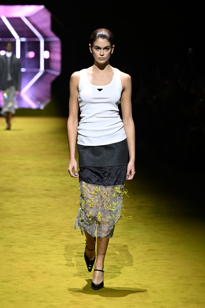 kaia gerber on the prada runway in white tank top