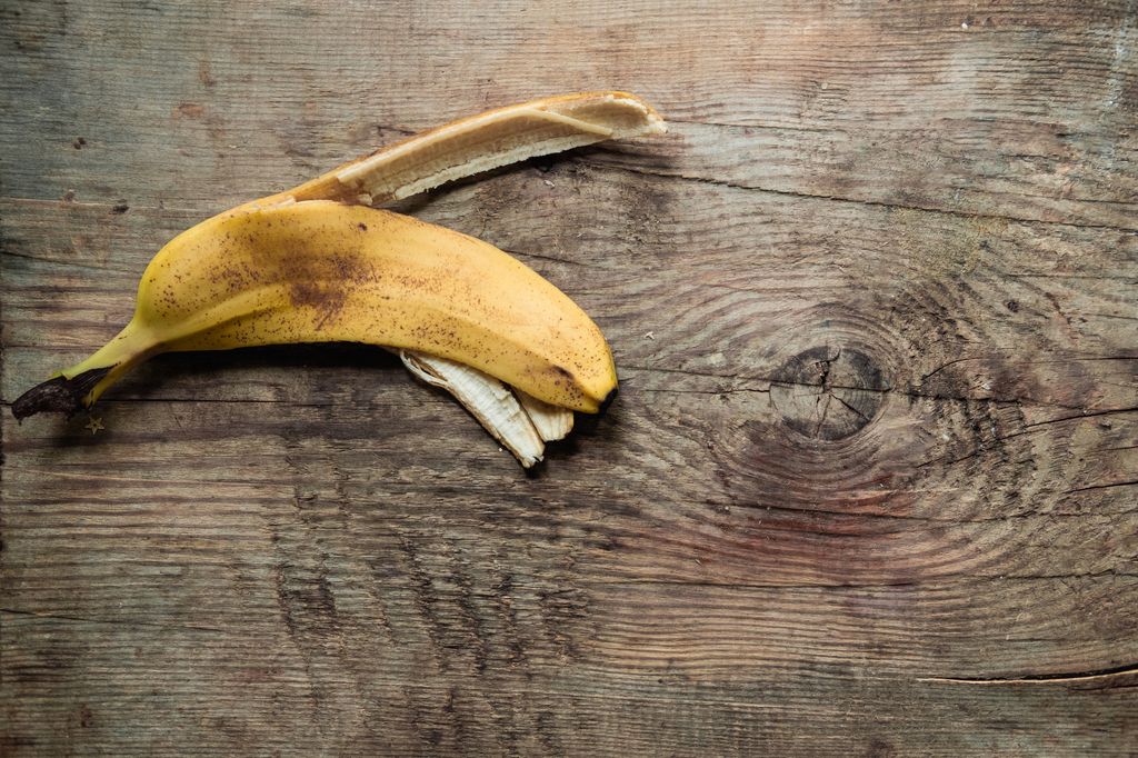 banana peel on wooden background